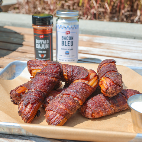 Buffalo & Bleu Cheese shotgun shells. Shotgun shells food are Manicotti noodles that are stuffed with meat, wrapped in bacon and are grilled or smoked. features Bacon Bleu Burger seasoning and Buffalo Cajun Wing Rub by PS Seasoning. 