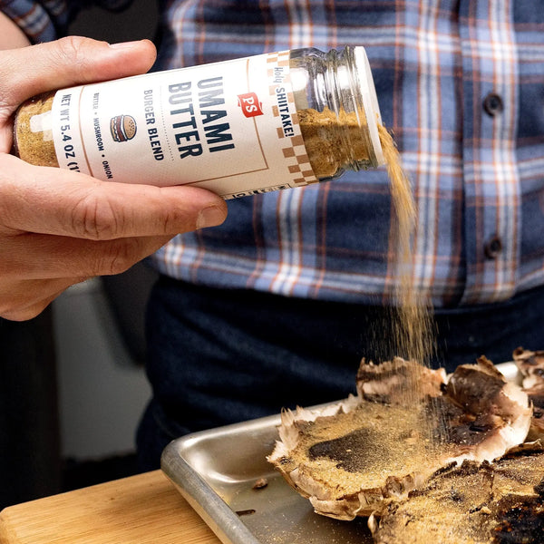 Umami Butter Burger Seasoning is sprinkled onto a portabella mushroom.